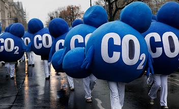 Environmental activists dressed up as CO
